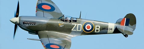 WWII-era RAF Spitfire in flight, ideal for tracing Royal Air Force service records and researching aircrew ancestors