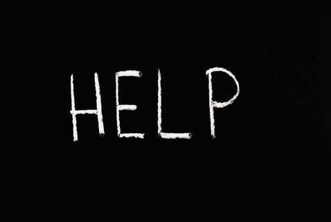 The word HELP written on a blackboard, symbolising the need for guidance with military records research