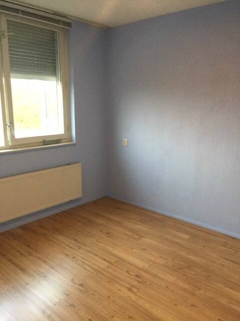 Eindresultaat logeerkamer na hulp met opruimen - professional organizing