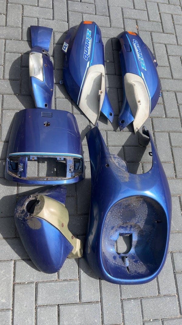 Piaggio Quarts kappen set blauwe