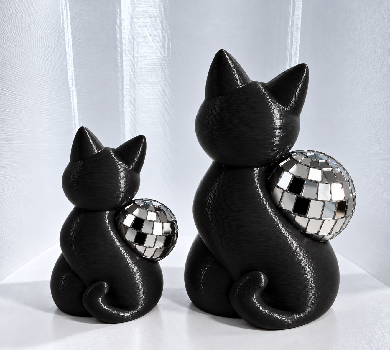 Kat met discobal