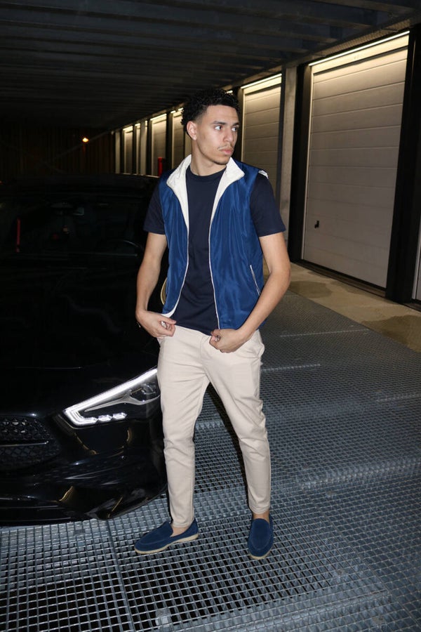 TWEEZIJDIG RESORT BODYWARMER BLAUW