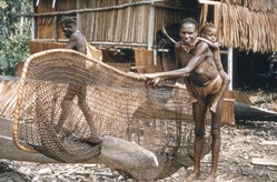Asmat vrouw met kind