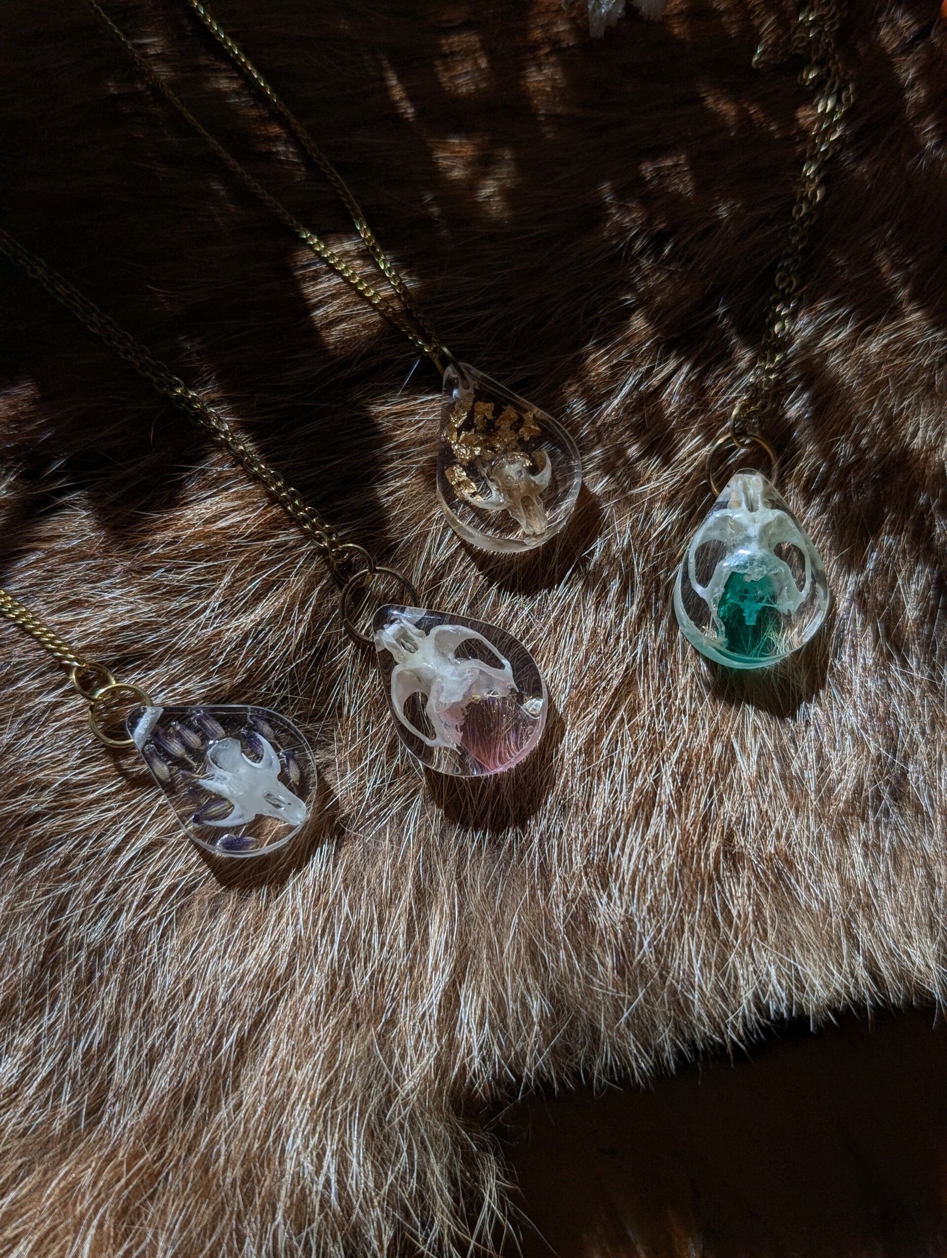 Mouse skull pendants