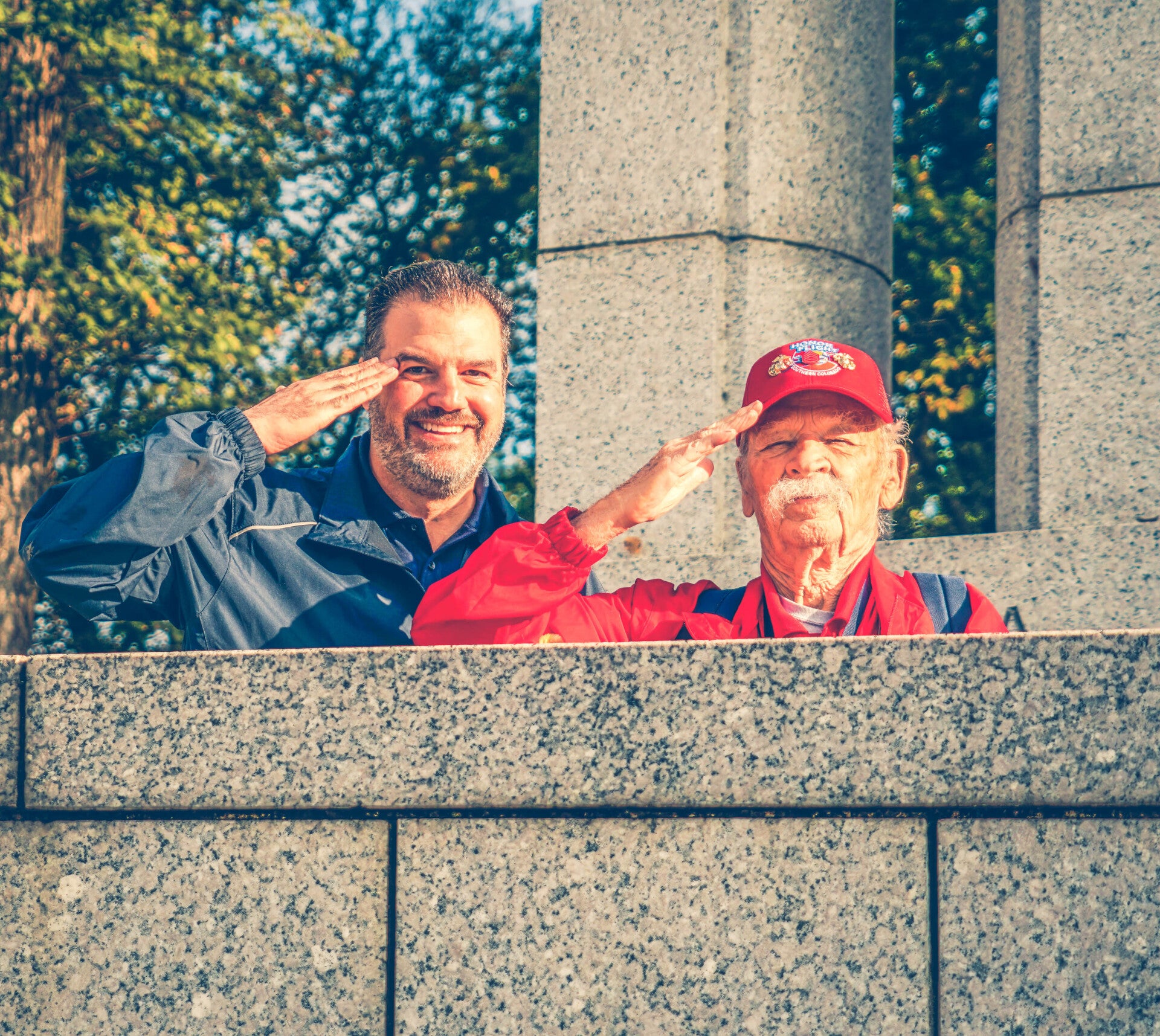 Guardian and veteran saluting