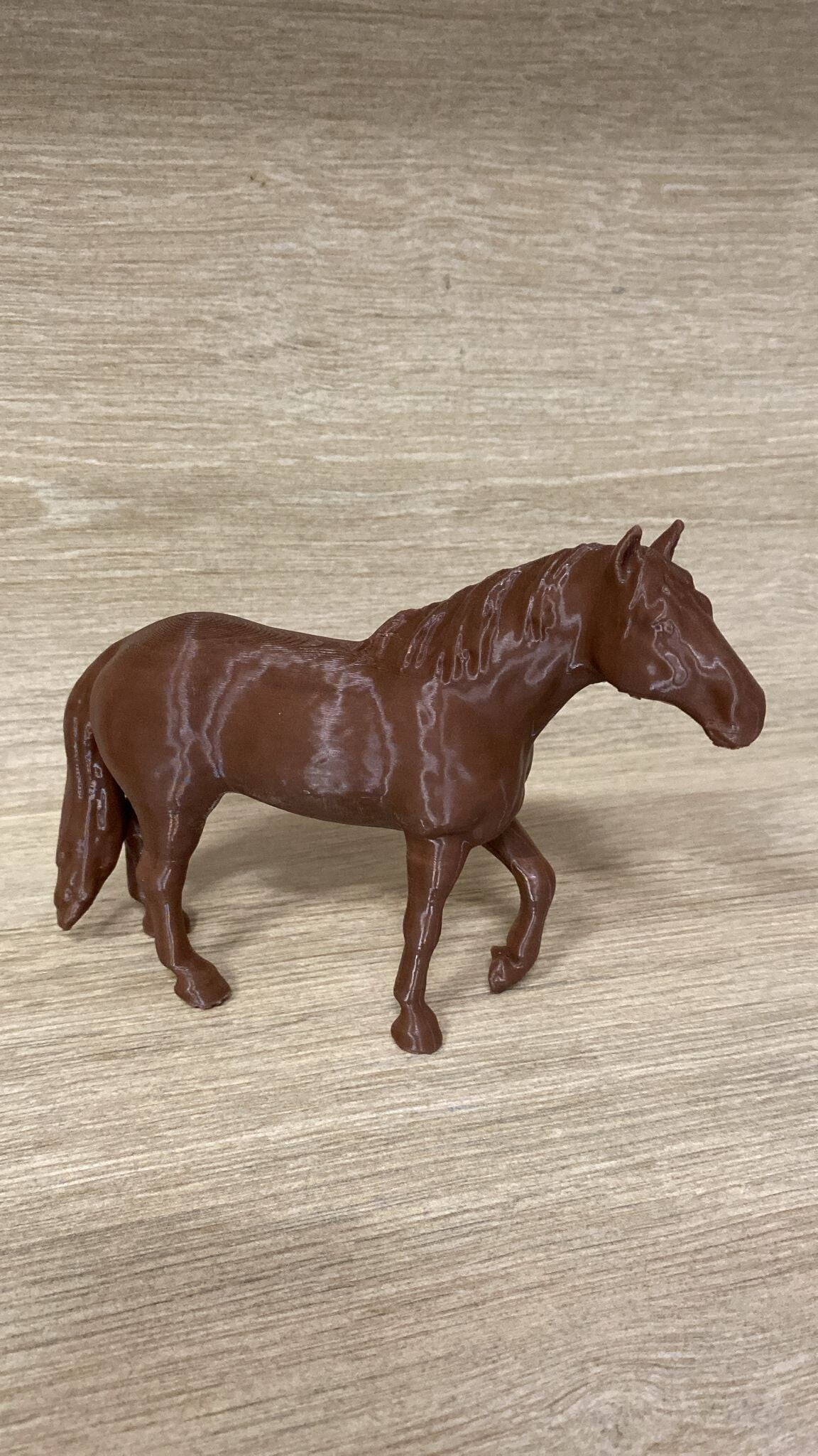 Caballo de 12 centímetros de alto y 16 de largo