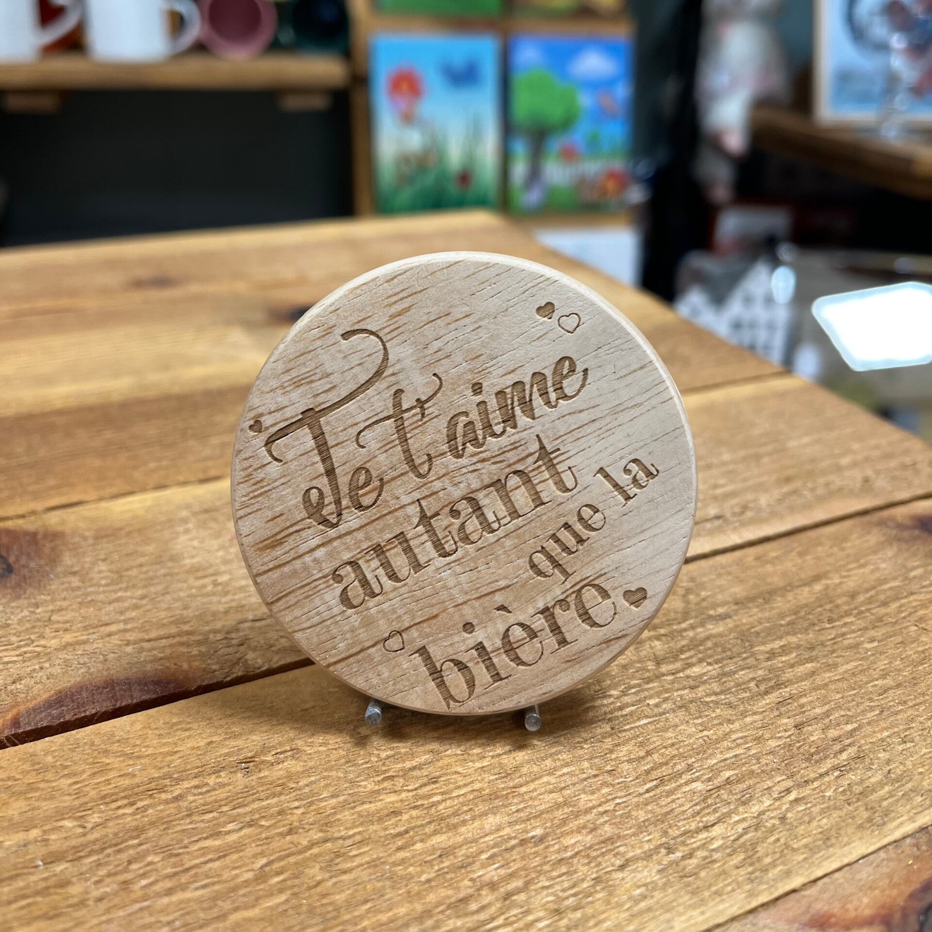 Sous-verre décapsuleur