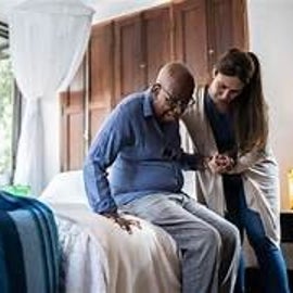 elderly man recieving compassionate care from a caregiver
