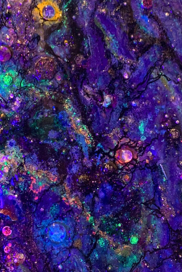 A rectangular shaped canvas, alive with vivid purples, blues and yellows - glowing vibrantly in UV light and fused with black lacing throughout.