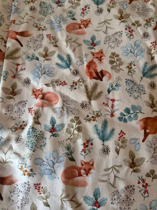 Stoff med rev og blader