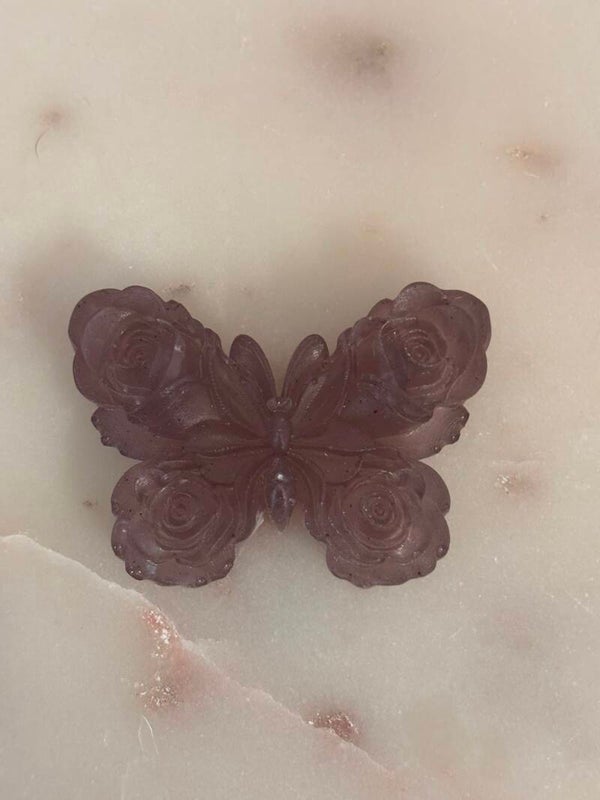 Vlinder met rozen