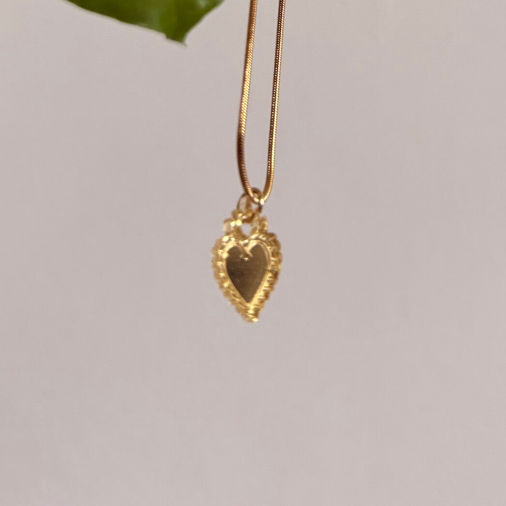 Collier coeur sacré or