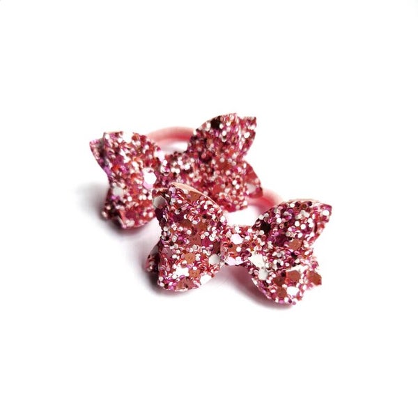 1 Santa cheek teeny bows