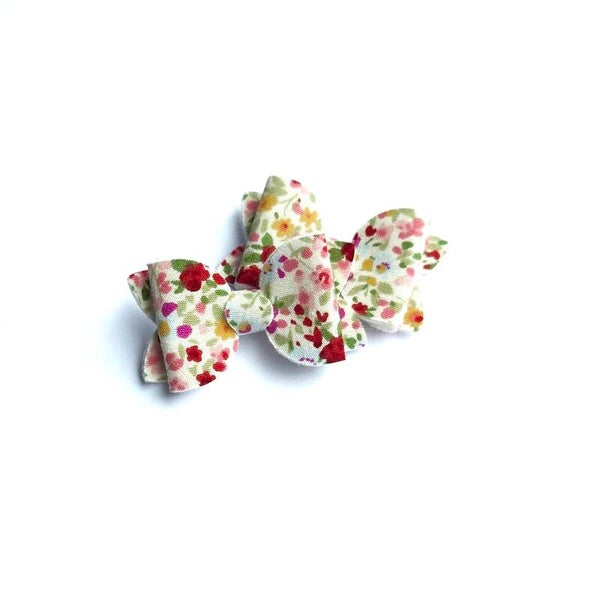 2 teeny weeny bows