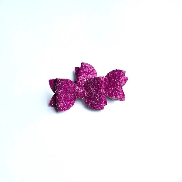 2 teeny weeny bows