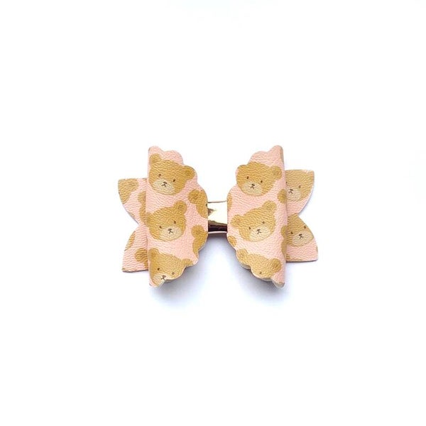 2 brown teddy bow