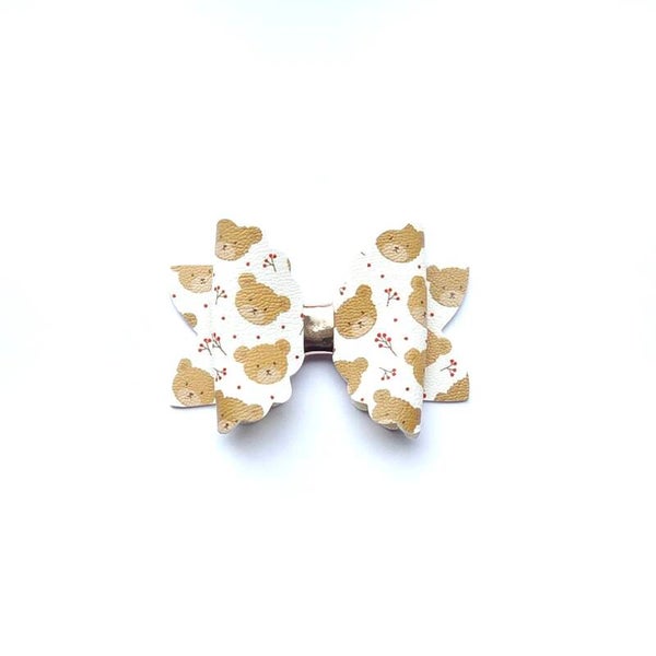 2 white teddy bow