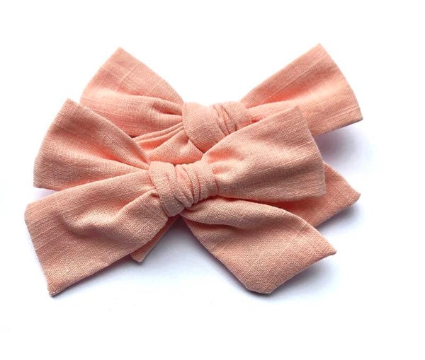 Peach piggy tails