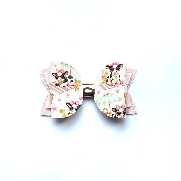 6 Sunbathing Cow bow