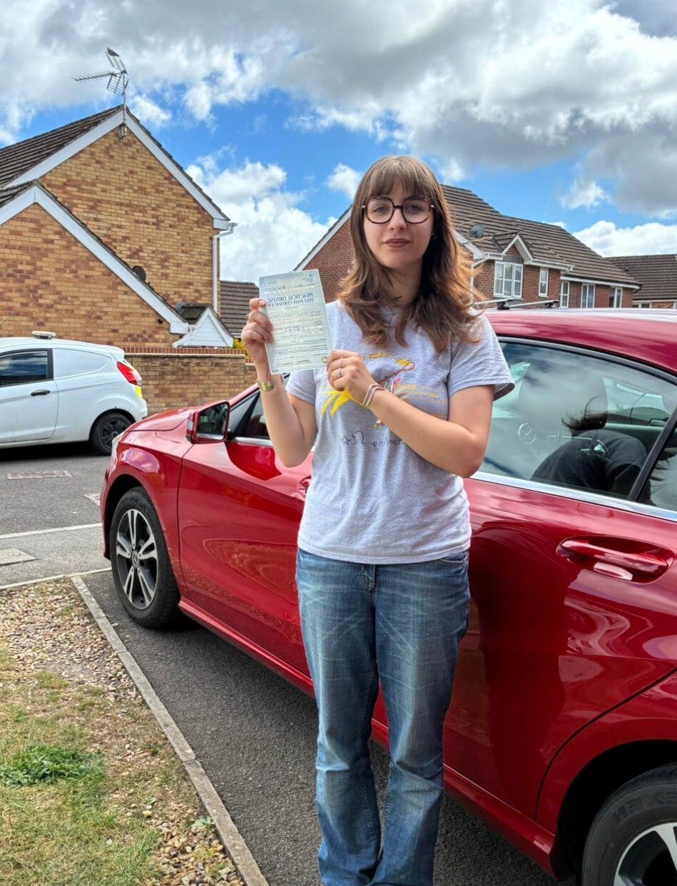 Happy driving test pass pupil with David from Wilko’s Wheels Driver Training, offering driving lessons in Milton Keynes, Newport Pagnell and Cranfield.