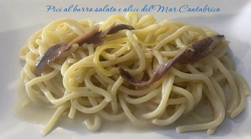 Pici al burro salato e alici del Mar Cantabrico