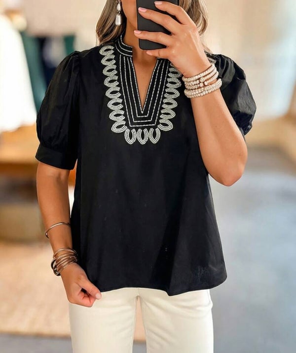 Short sleeve contrast embroidered detail vneck blouse