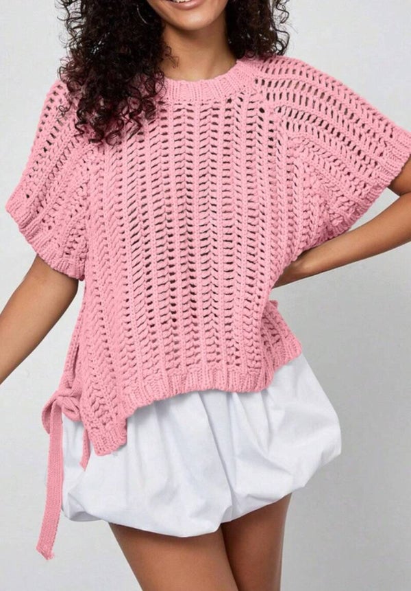 Pink knited loose fit sweater top with ties on side