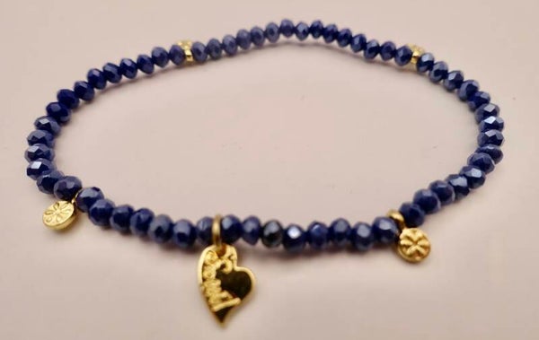 ARbl014724: Donkerblauw, heel fijn armbandje met goudmetalen bedel.
