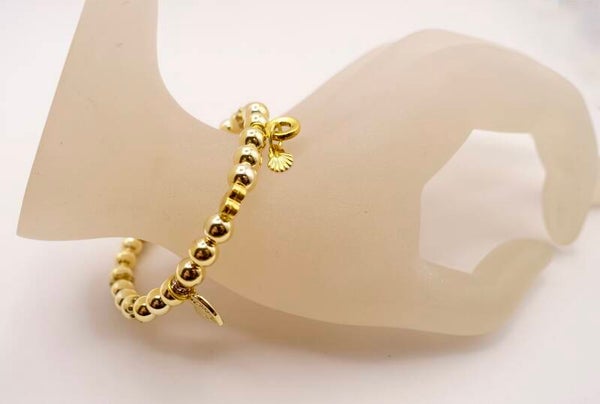 ARgo011326: Lief goudmetalen armbandje met bedels