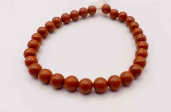 ARor014625: Terra armbandje van jaspis. Warme tint.