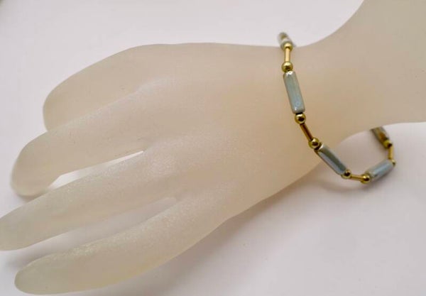 ARtu012426: Armbandje van Grieks keramiek in pastel-turquoise en beige.