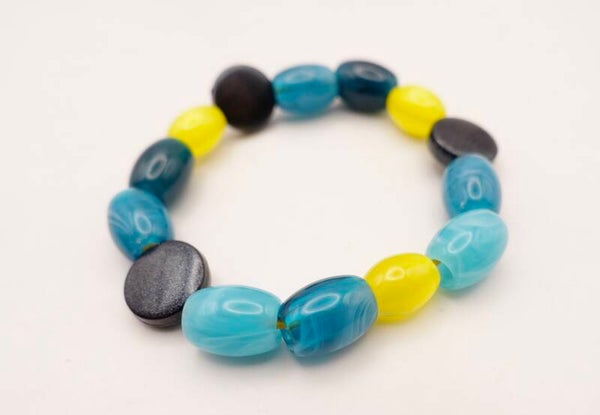 ARtu014226: Elastisch armbandje in turquoise, petrol, blauw en geel.