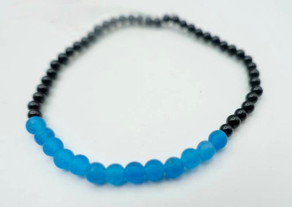 ARtu015024: Zwart met turquoise armbandje van onyx met agaat.