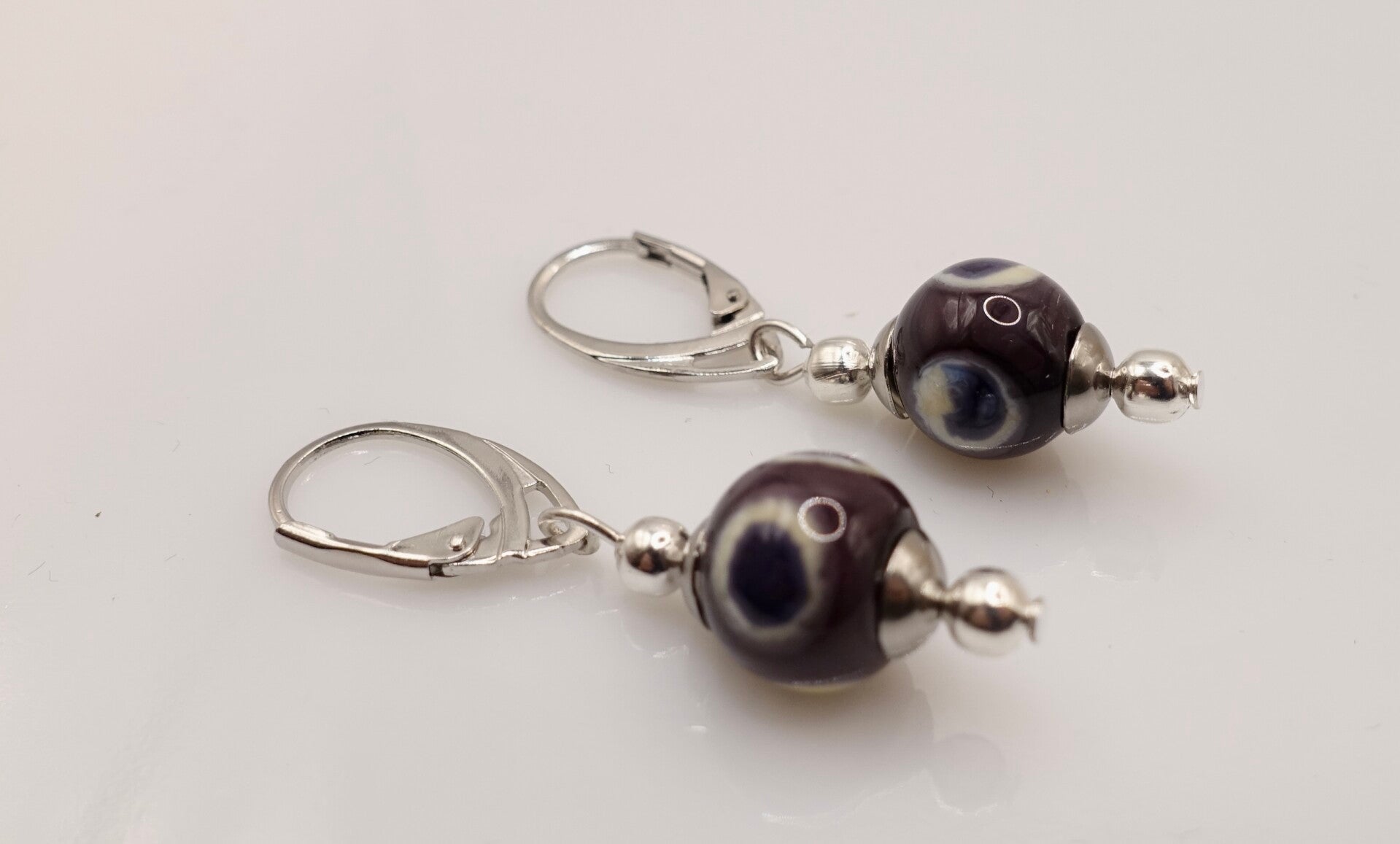 OBpa011124: Prachtige, warm paarse oorbelletjes uit eigen atelier.