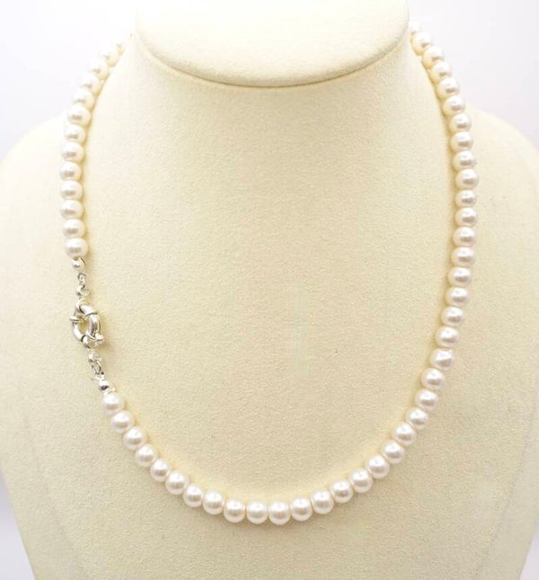 KKwit023426: Ketting van champagne glasparels met zilvermetalen sluiting.