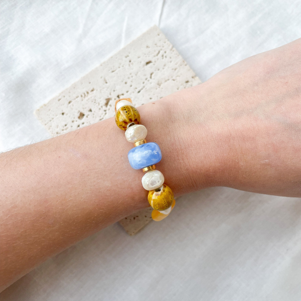 Bracelet perles asymétriques jaune/bleu