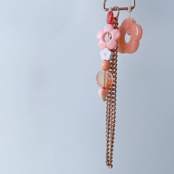 Charms sac fleurs corail