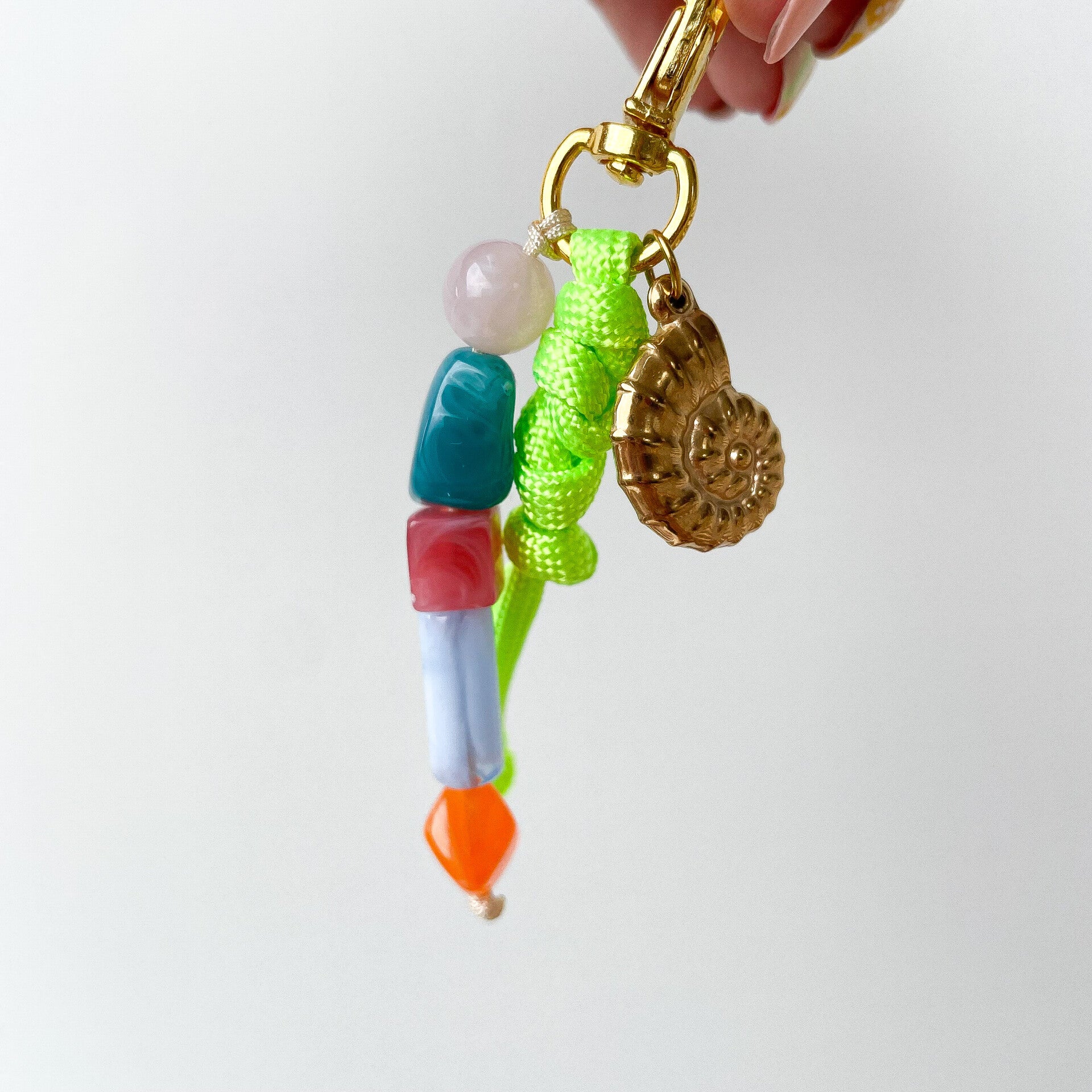 Charms doré coquillage