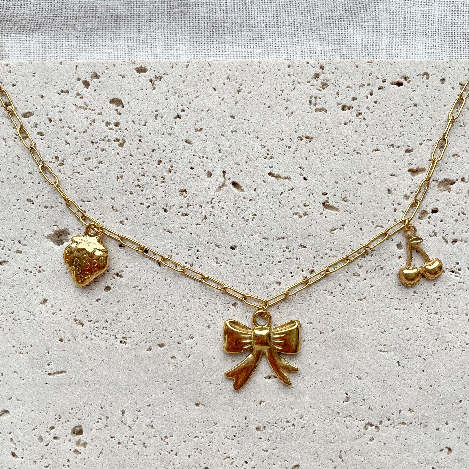 Collier charms nœud & fruits – Acier inoxydable