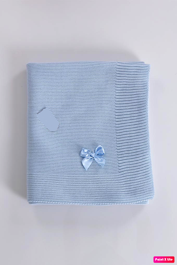 Couverture Tricotée avec lasse