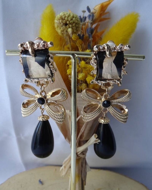 Boucles D'oreilles Clips pendantes en Résine avec un Nœud