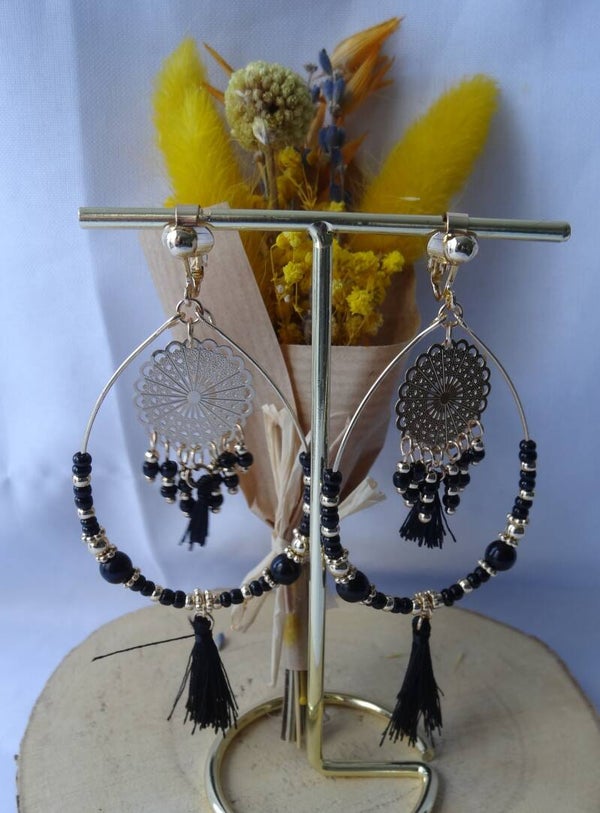 Boucles d'oreilles pendantes avec pompon à clips