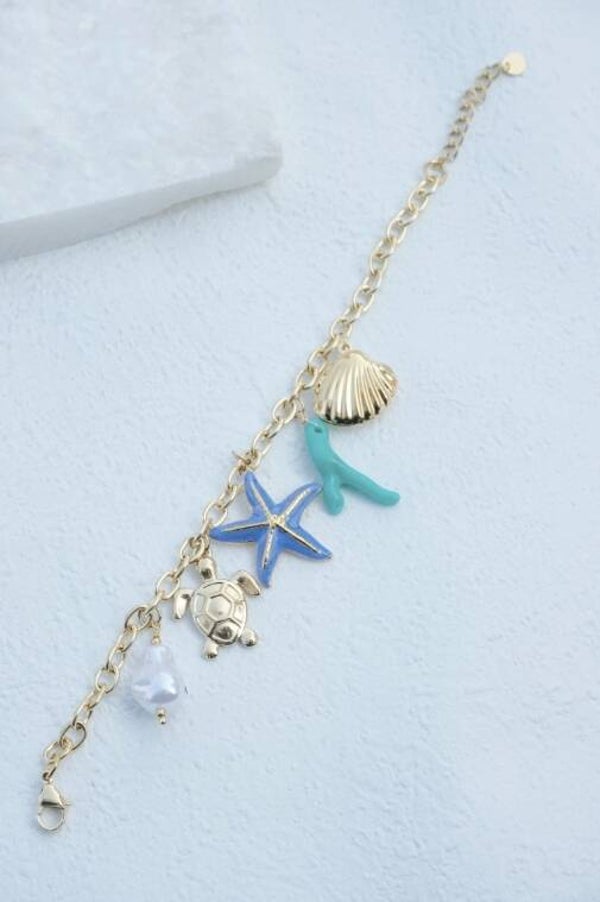 Bracelet charms marins, perles, tortue, étoiles de mer, algues et coquillage