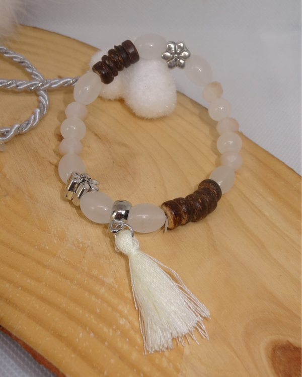 Bracelet élastique pompon ( divers colories)