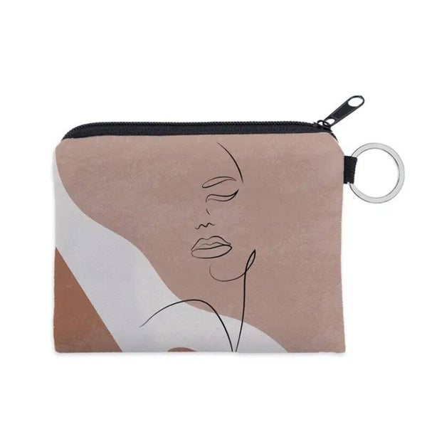 Porte monnaie avec un  visage