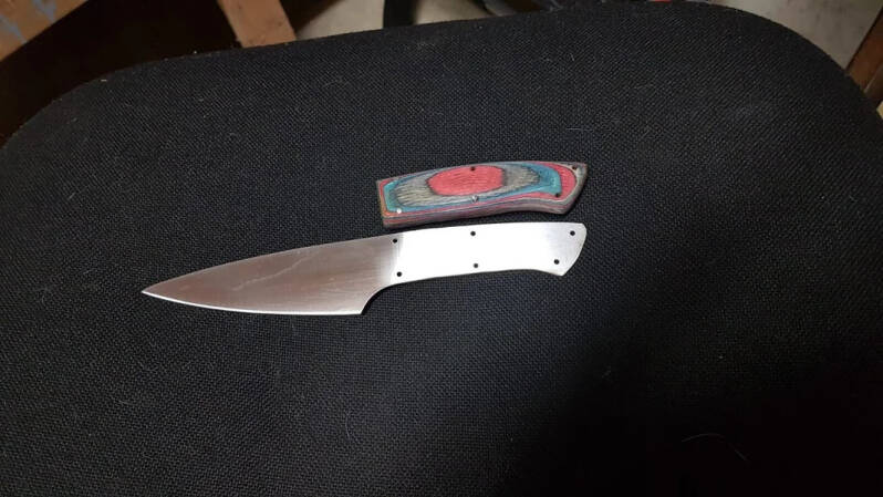 A small kitchen knife before it has its handle