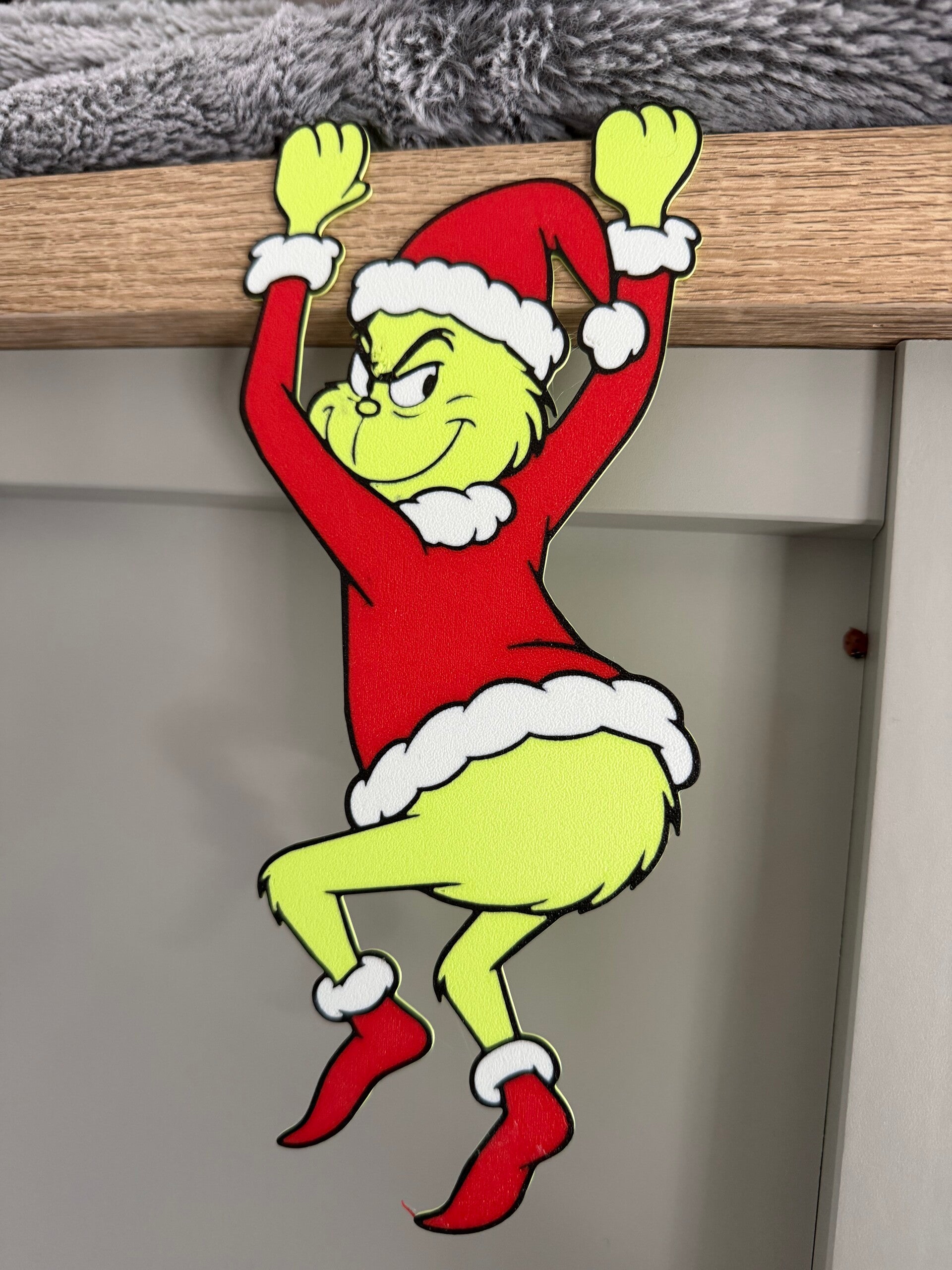 The Grinch shelf hanger