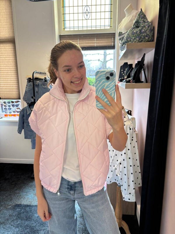 Lichtroze bodywarmer