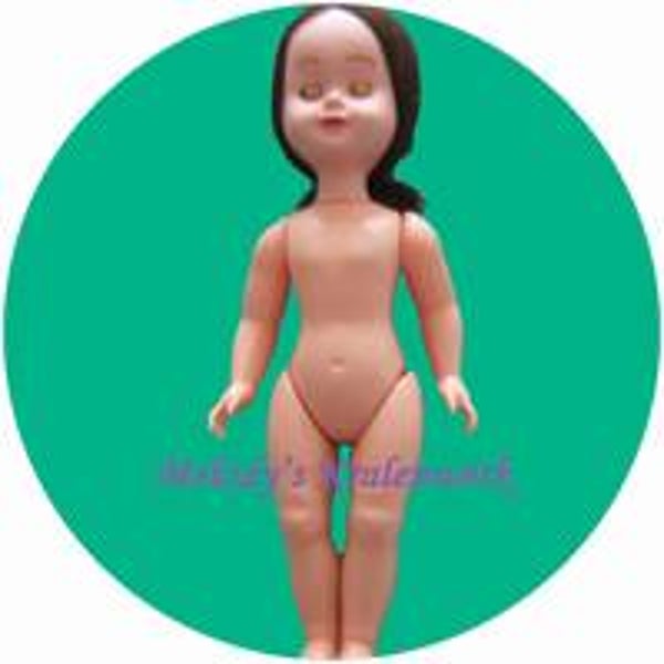 Pop 25 cm met korte bruine staart