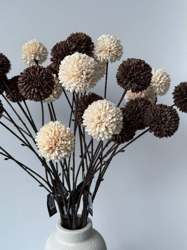 Pompons creme en bruin